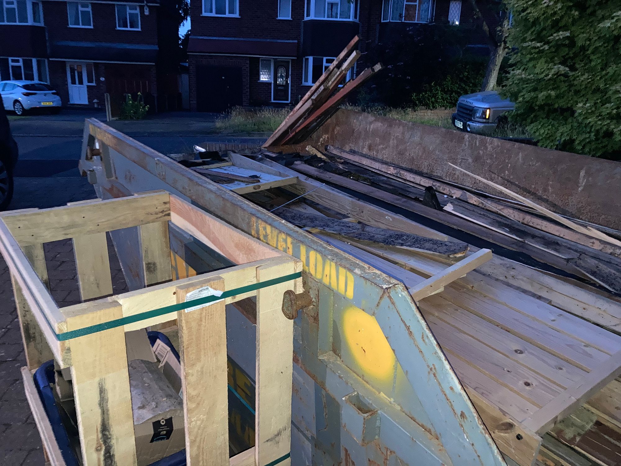 A skip full of broken sheds