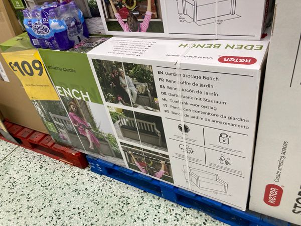 Boxes of garden furniture in a store 